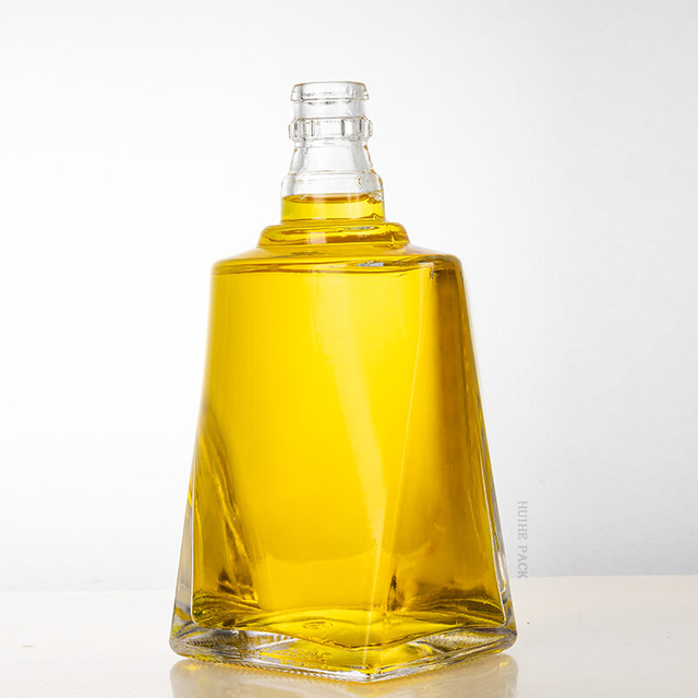 Botella de licor de vidrio de fondo cuadrado y de hombro redondo