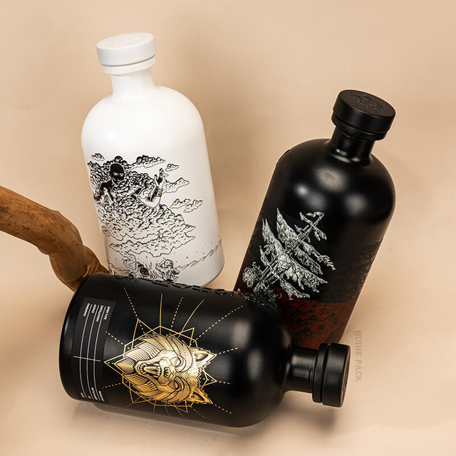 Patrones únicos de estampado caliente botella de licor de vidrio de hombro redondo