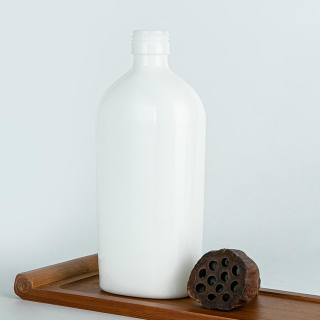 450 ml Botella de vino amarillo de cerámica blanca ovalada