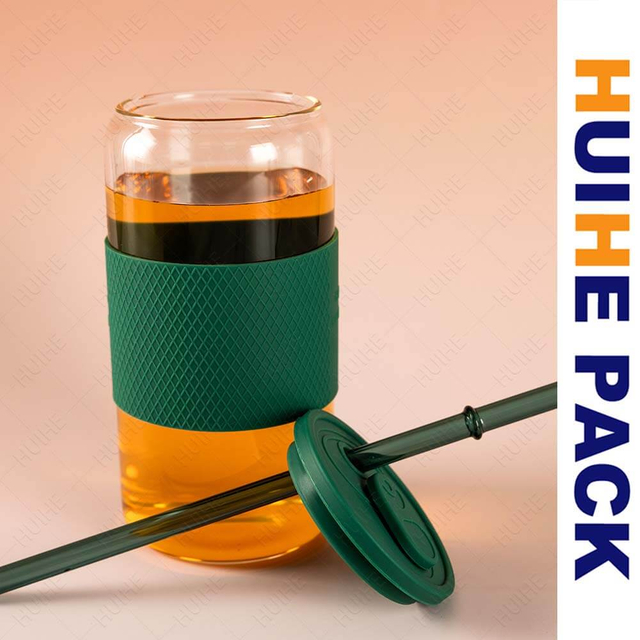 Botella cil&iacute;ndrica alta de vidrio transparente de borosilicato con banda de silicona