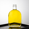 Botella de licor de vidrio claro ovalado con tornillo de tornillo