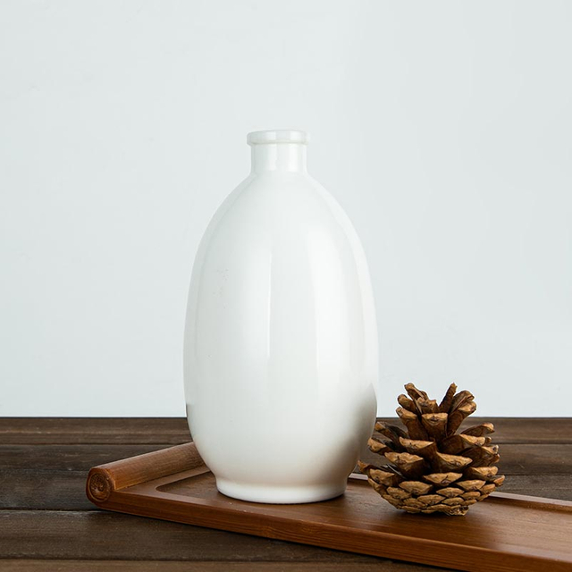 Botella de licores de vidrio opalino redonda de 50 cl