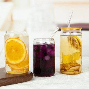 Lata de bebida de vidrio de borosilicato con alto contenido de cola con pajita y tapa