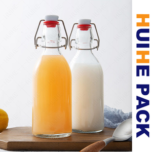 350ml 500ml 750ml 1000ml Botella de bebida de vidrio transparente con tapa abatible