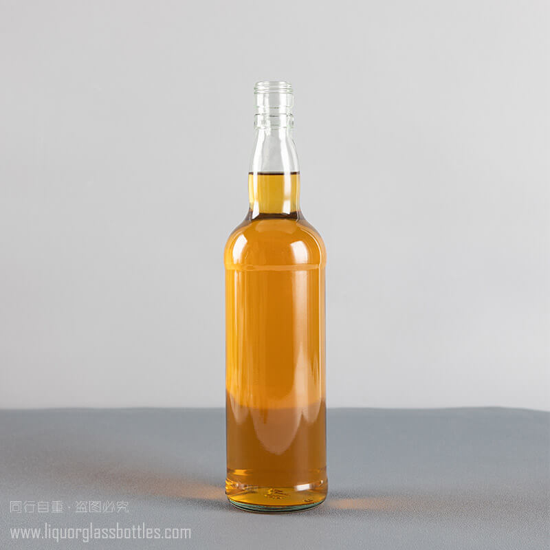 Botella de whisky escocés de vidrio de pedernal transparente redonda al por mayor de 720 ml