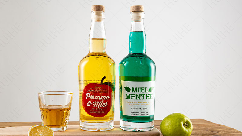 Botella de licor redonda cl&aacute;sica - botella de licor de Tennessee