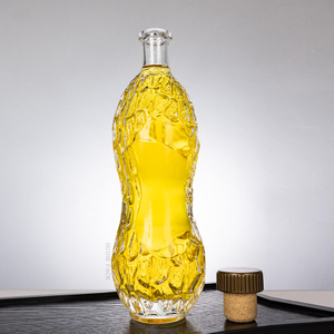 Botella de whisky de vidrio transparente irregular de 750 ml con corcho personalizado