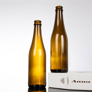 Venta caliente 350 ml Botella de cerveza de vidrio vacío Amber con gorra de corona