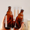 Botella de cristal de cerveza vacía con forma de oso pardo de 330 ml y 500 ml