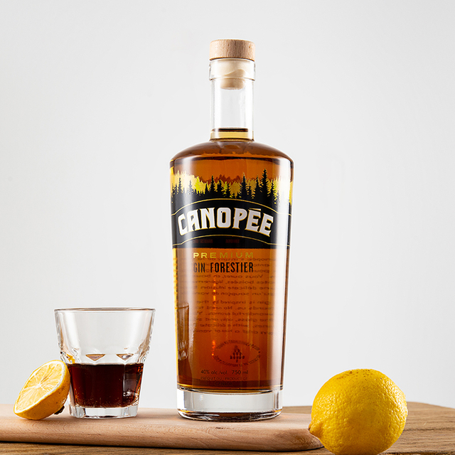 Decantador de vidrio de whisky redondo con tapón de corcho