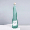 Botella de vodka de vidrio transparente irregular de 700 ml con corcho