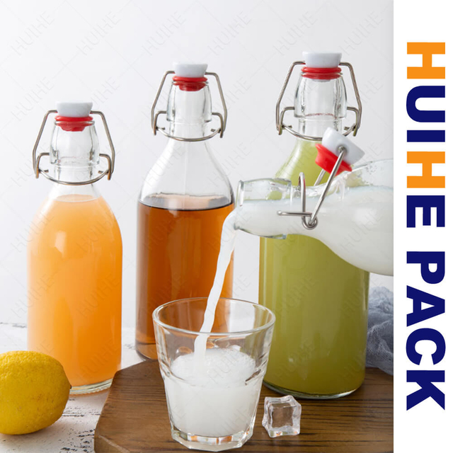 350ml 500ml 750ml 1000ml Botella de bebida de vidrio transparente con tapa abatible