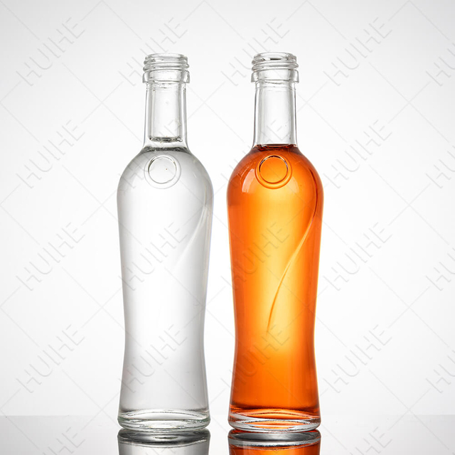 Botellas de alcohol en miniatura de vidrio transparente redondo de 50 ml al por mayor de f&aacute;brica
