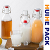 350ml 500ml 750ml 1000ml Botella de bebida de vidrio transparente con tapa abatible
