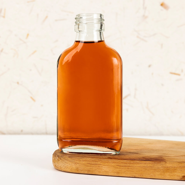 En stock 100 ml de frasco plano Vodka Botellas de vidrio de bolsillo para la venta