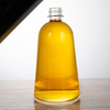 Botella de licor de vidrio de 500 ml de forma de campana con curvas suaves