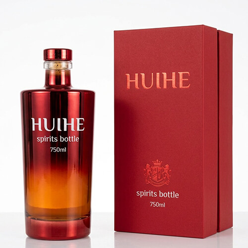 Se vende botella de licor rojo.