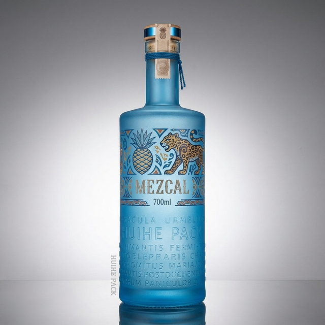 Letras elevadas botella de licor de vidrio de cilindro texturizado