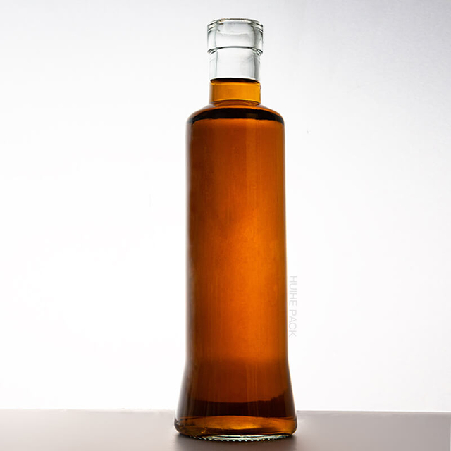 Botella de bebida de vidrio transparente con cilindro de 300 ml al por mayor