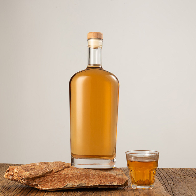Botella de licor de vidrio de matraz ovalado de Philly con corcho superior