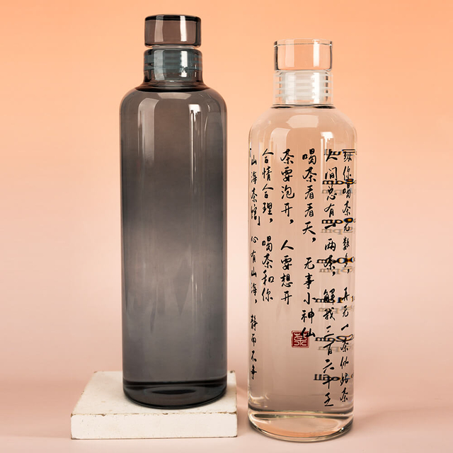 Botella de agua potable de vidrio de borosilicato con logotipo de impresi&oacute;n personalizada a la venta
