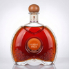 Botella de licor ovalada plana con patr&oacute;n de cadena alrededor