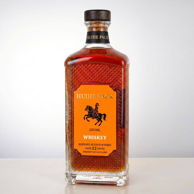 Botella de licor de vidrio cuadrado de 1000 ml en relieve