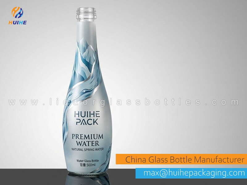 Etiquetas de manga retr&aacute;ctil botellas de agua.jpg