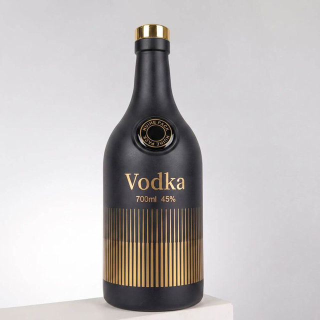 Botella de liquor de vidrio de cilindro bulboso redondeado