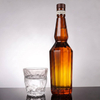 Botella de whisky de vidrio angular hexagonal con cuello largo